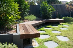 Custom raised garden bed and bluestone steppers