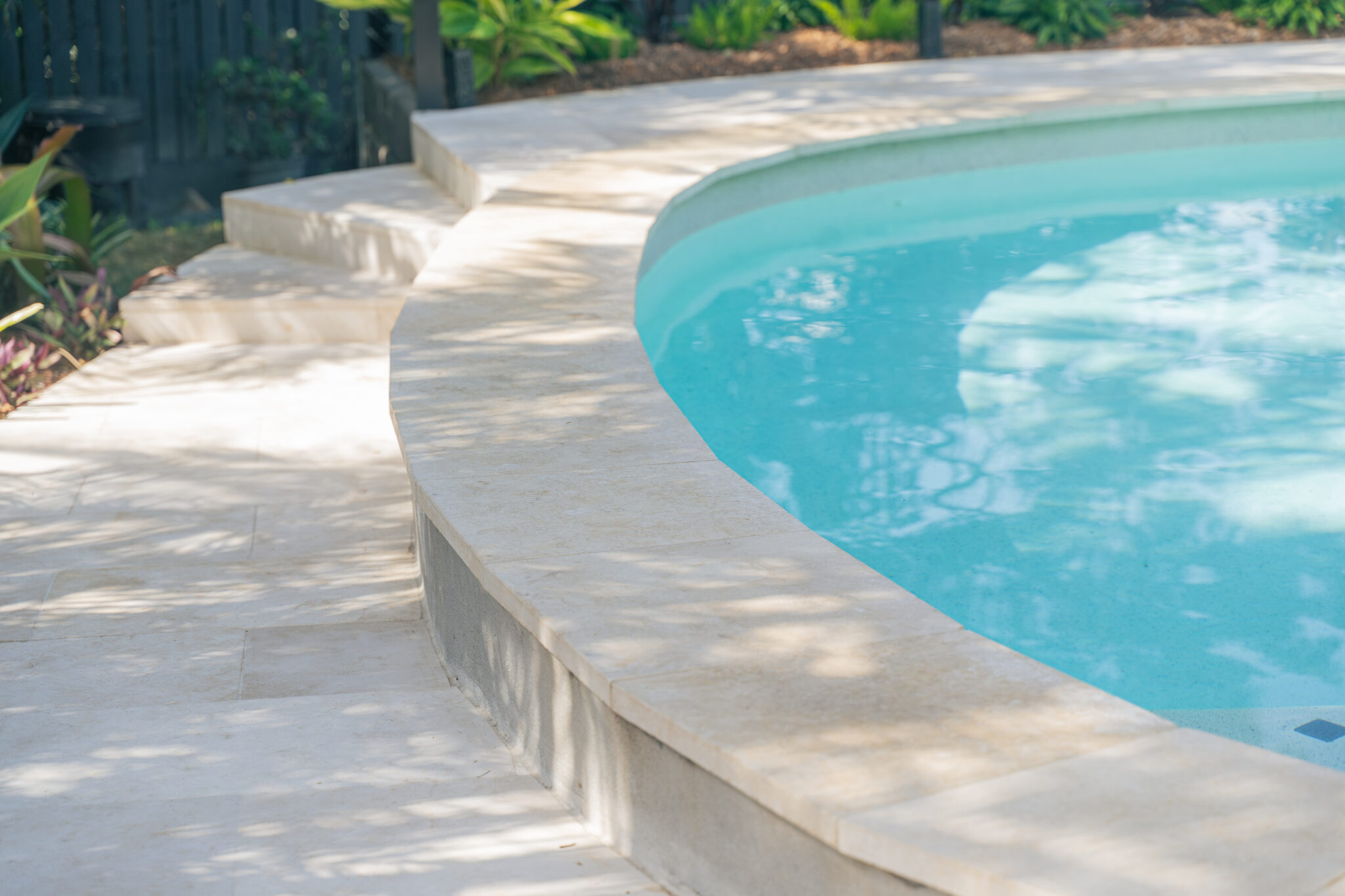 Travertine pool tiles