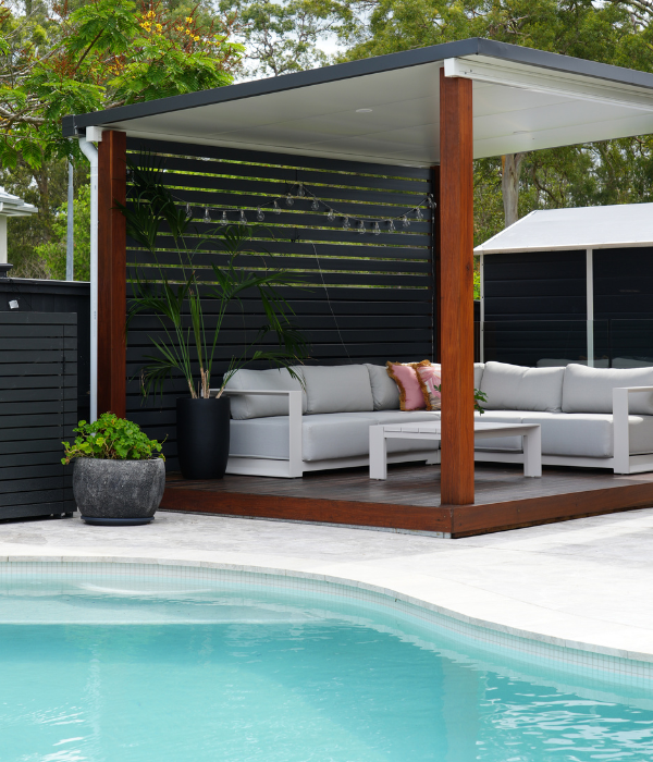 “Suburban poolside garden in Mansfield with curved pool design, paving ...